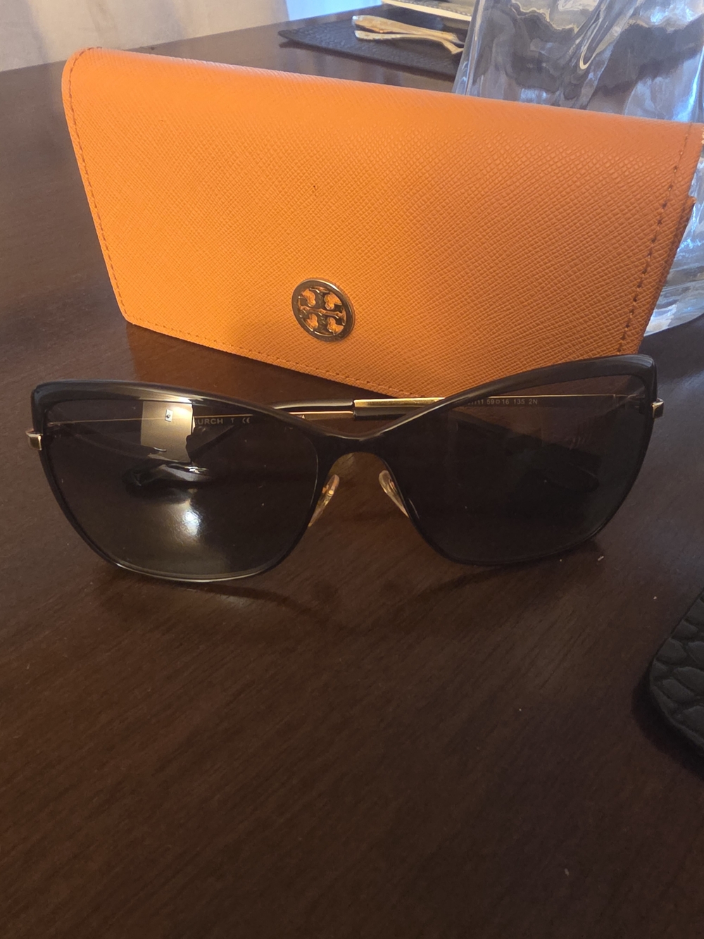 Tory Burch Orange Case with Black Sunglasses and Gold Accents